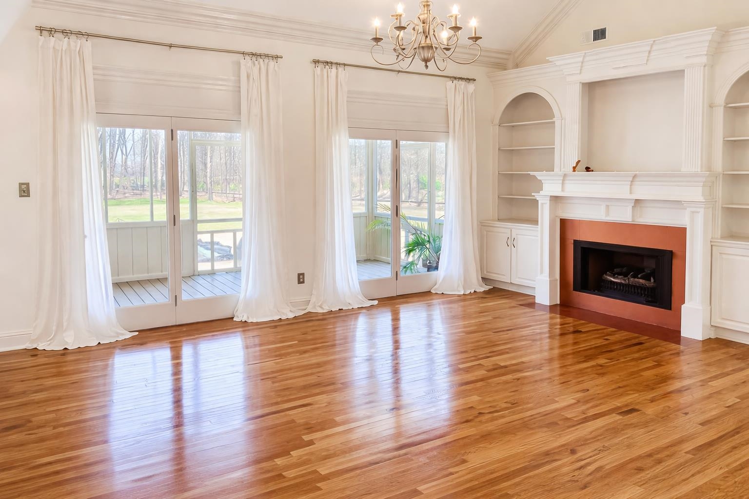 565 Schaeffer Loop Eads, TN 38028 - Photo 7 of 33 a view of an empty room with wooden floor and a window