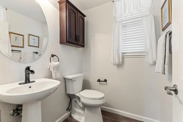 a view of a hallway with windows