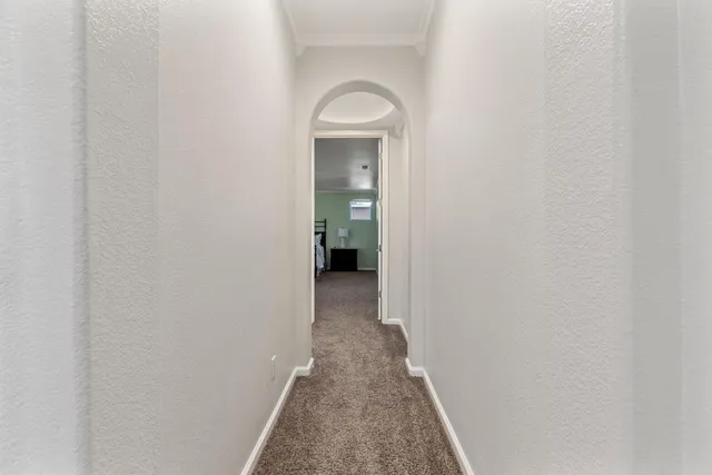 a bed room with a bed and a couch