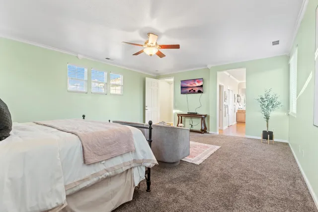 a bathroom with a tub sink and a mirror