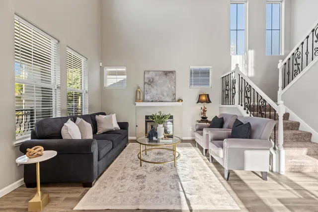 a view of livingroom and dining room with furniture