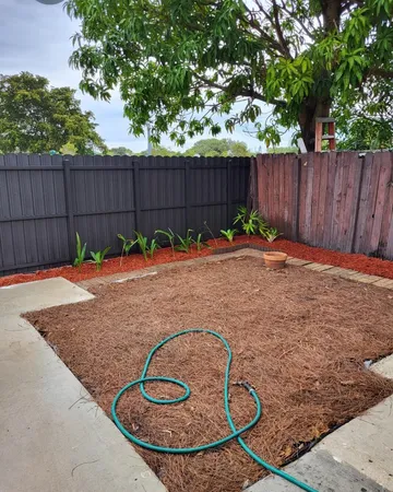 a view of a backyard with a slide