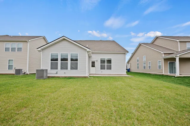 a view of a house with a garden