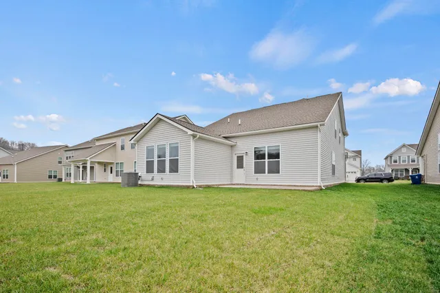 a view of a house with a big yard