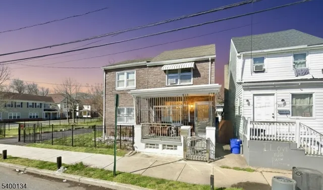 a front view of a house with a porch