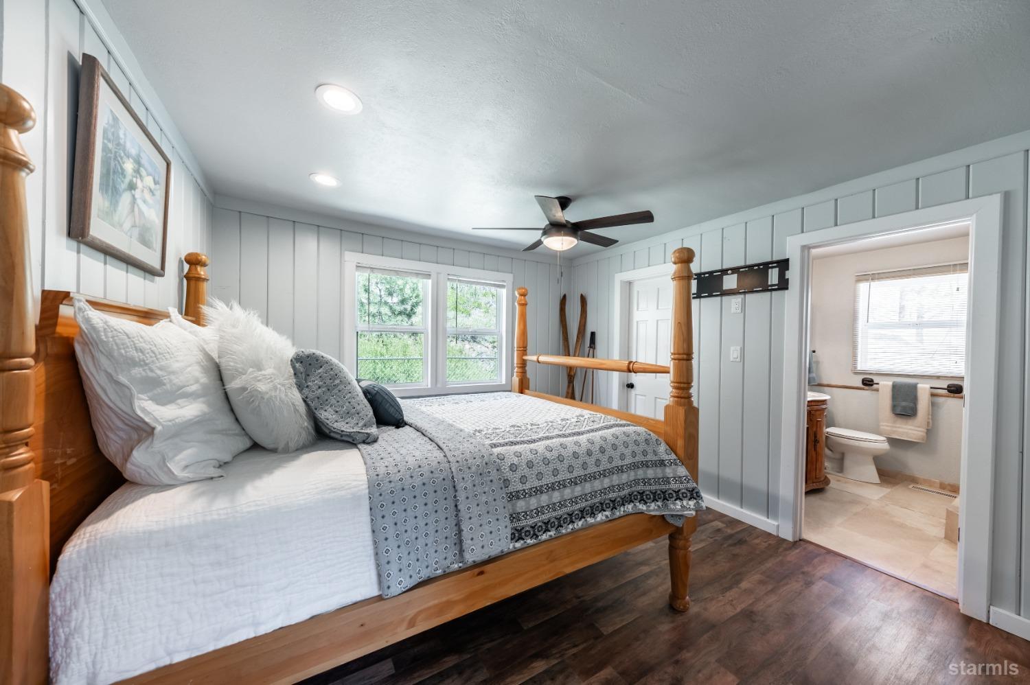 15740 Highway 89 Markleeville, CA 96120 - Photo 11 of 24 a bedroom with a large bed and a window