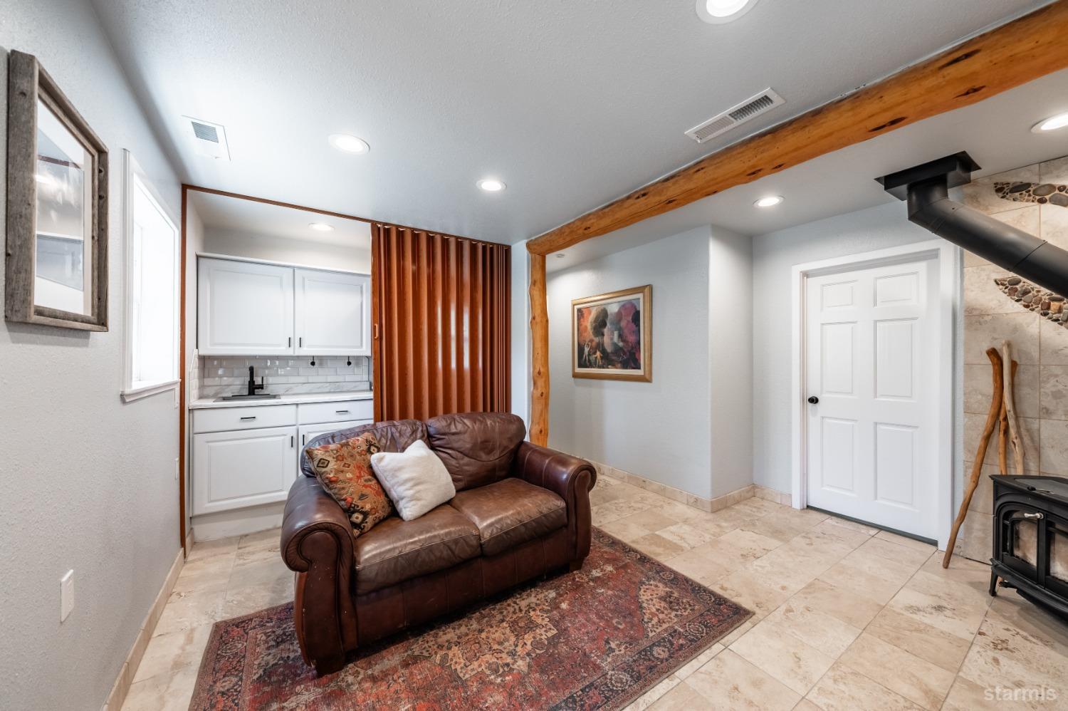 15740 Highway 89 Markleeville, CA 96120 - Photo 13 of 24 a living room with furniture and a open kitchen view