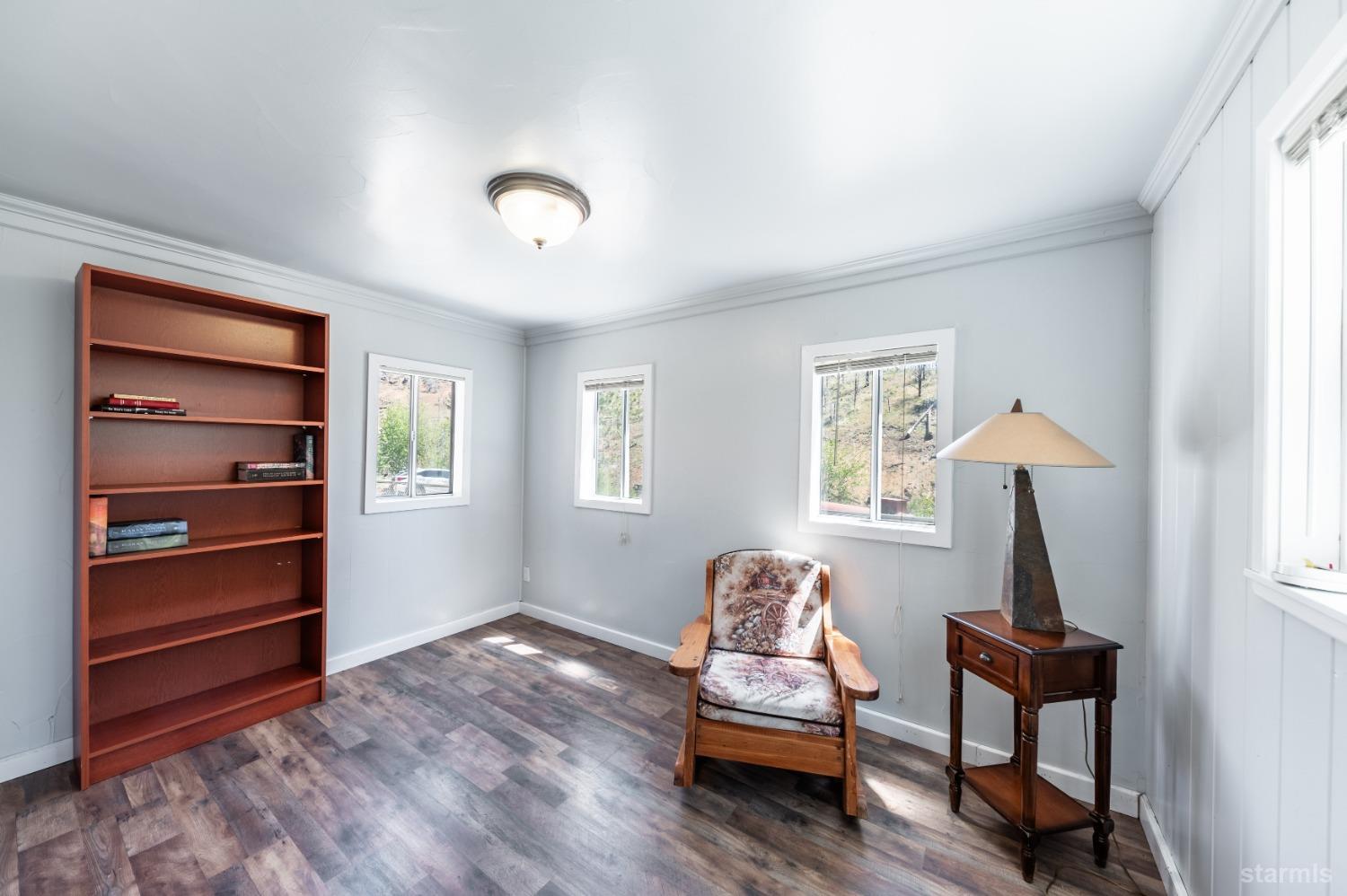 15740 Highway 89 Markleeville, CA 96120 - Photo 16 of 24 a living room with furniture and a window