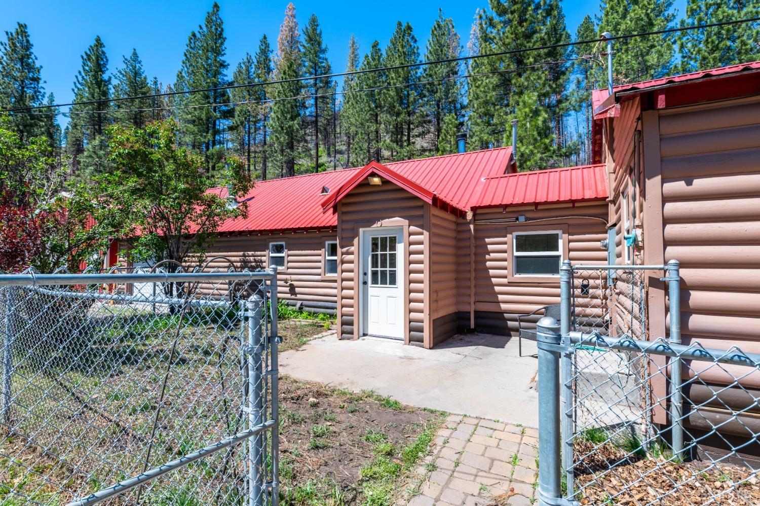 15740 Highway 89 Markleeville, CA 96120 - Photo 21 of 24 a front view of a house with a garden