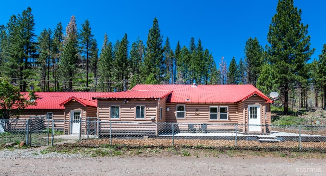 15740 Highway 89 Markleeville, CA 96120 - Photo 3 of 24 a view of a house with a yard and tree s