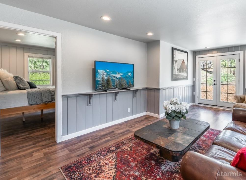 15740 Highway 89 Markleeville, CA 96120 - Photo 9 of 24 a living room with furniture and a flat screen tv