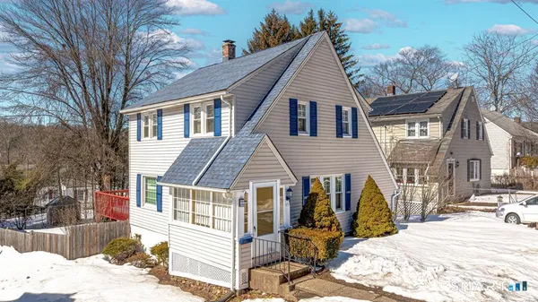 a front view of a house with a patio