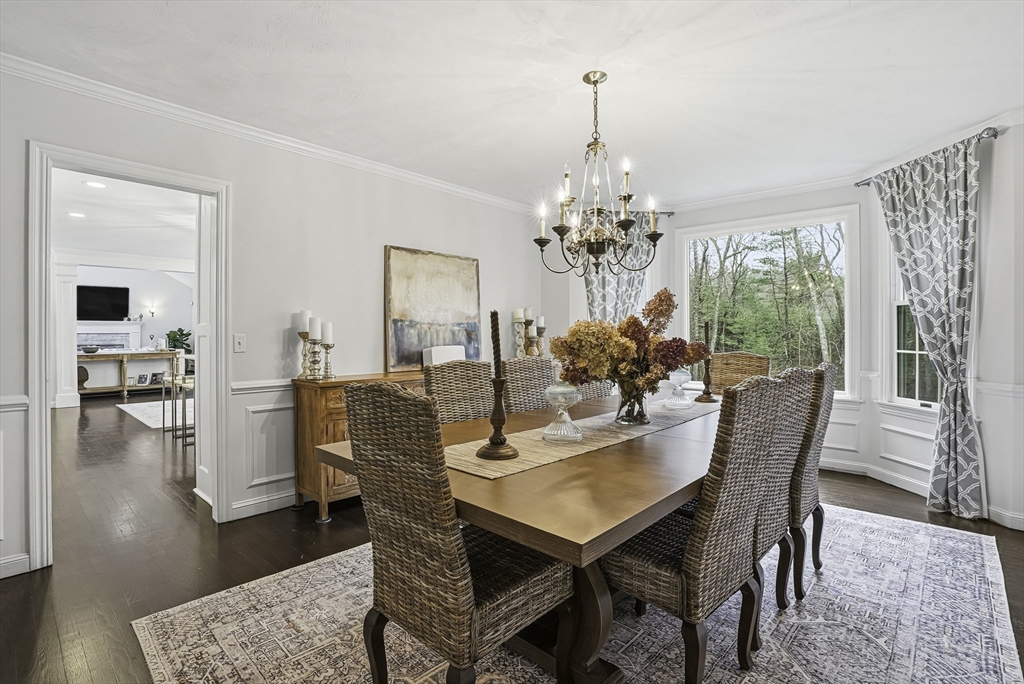 20 Thayer Road Mendon, MA 01756 - Photo 15 of 42 a dining room with furniture a chandelier and wooden floor