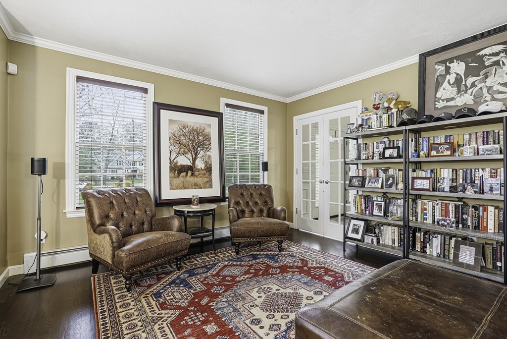 20 Thayer Road Mendon, MA 01756 - Photo 18 of 42 a living room with furniture and a book shelf