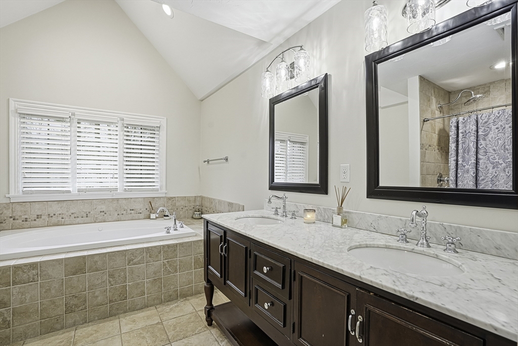 20 Thayer Road Mendon, MA 01756 - Photo 24 of 42 a bathroom with a granite countertop sink and a bathtub