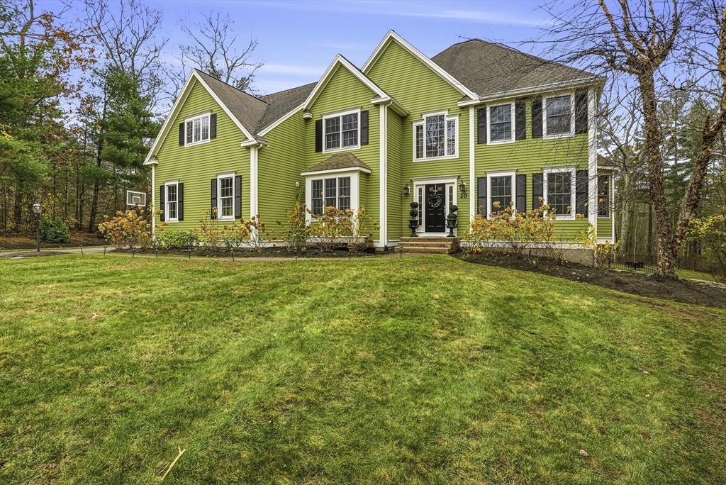 20 Thayer Road Mendon, MA 01756 - Photo 31 of 42 a front view of a house with a yard