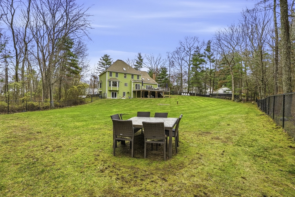 20 Thayer Road Mendon, MA 01756 - Photo 41 of 42 a view of a house with a yard patio and fire pit