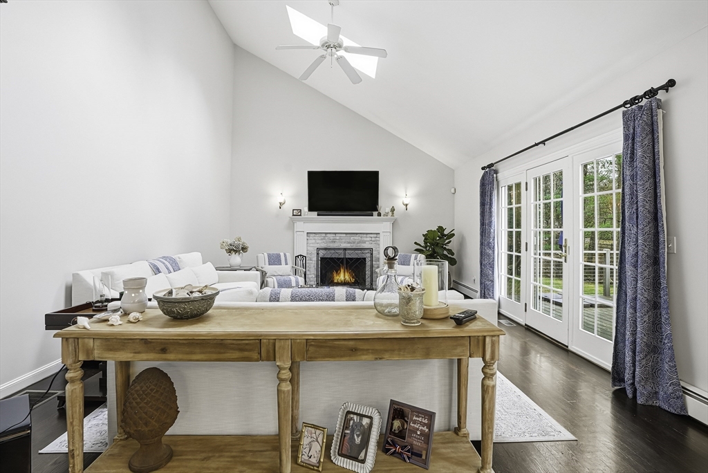 20 Thayer Road Mendon, MA 01756 - Photo 5 of 42 a dining room with furniture a fireplace and wooden floor