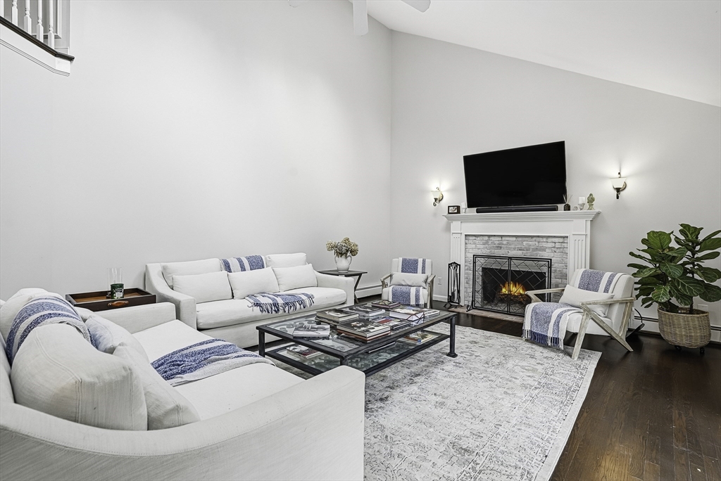 20 Thayer Road Mendon, MA 01756 - Photo 6 of 42 a living room with furniture fireplace and a flat screen tv
