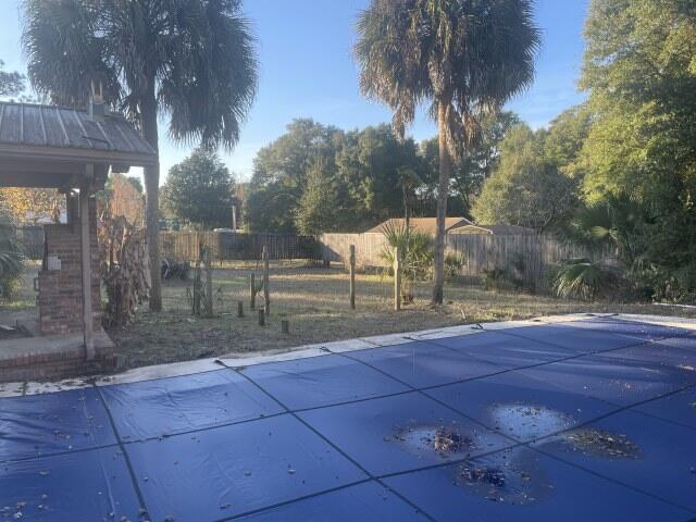 6047 Eden Square Crestview, FL 32539 - Photo 5 of 39 a view of backyard and tree