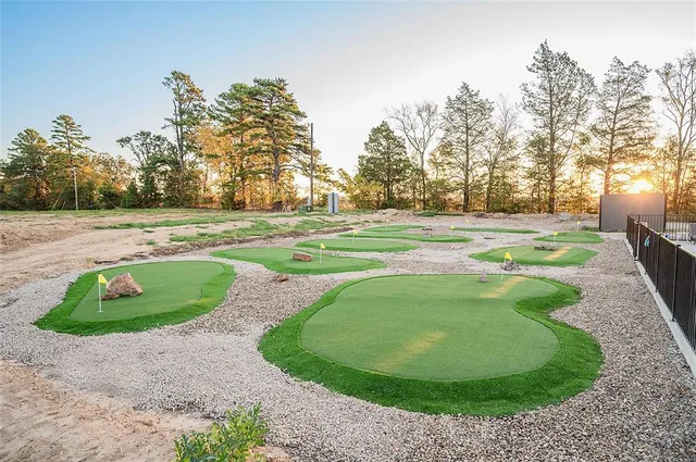 a view of a golf course with a garden