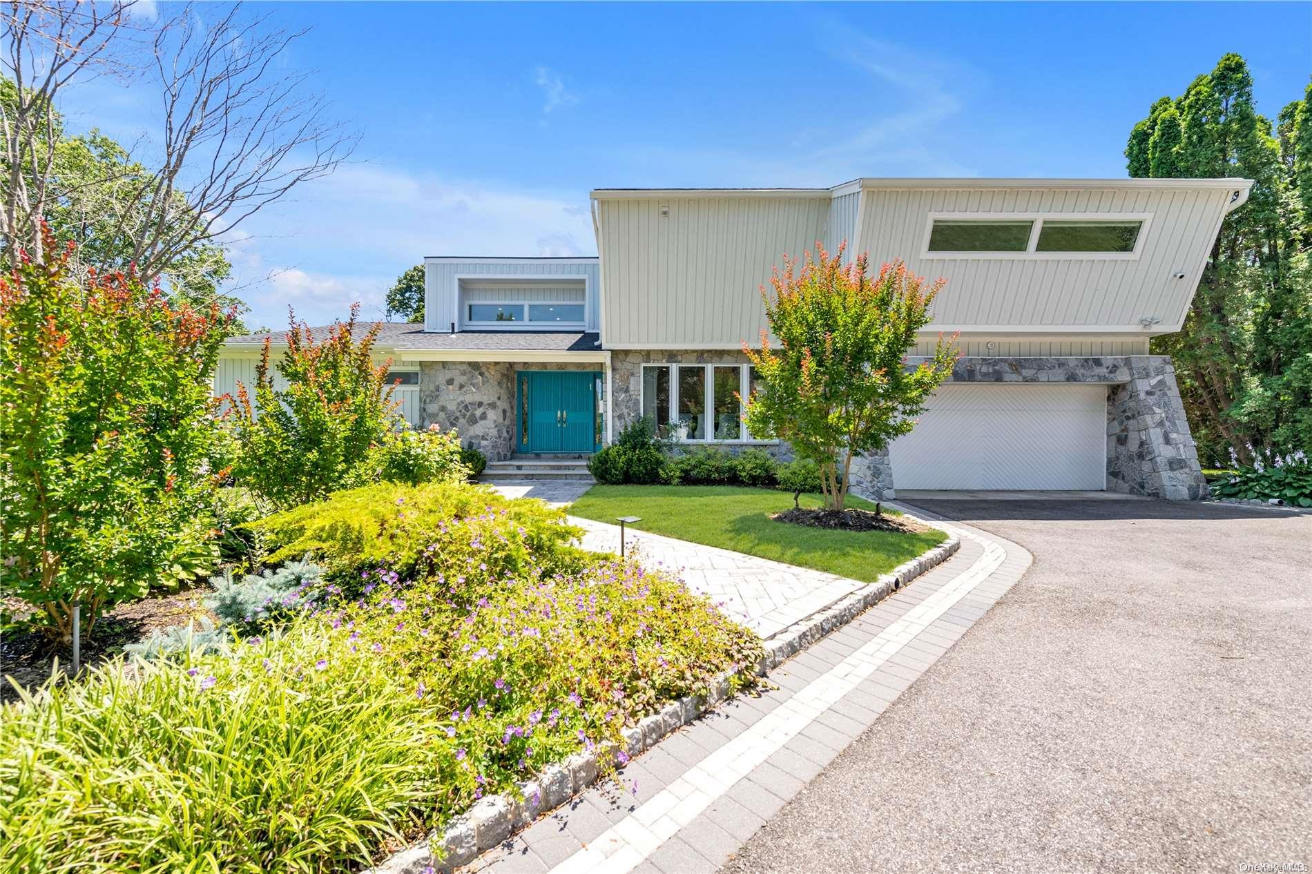 3 B Woodland Road, Unit B Roslyn, NY 11576 - Photo 1 of 1 a front view of house with yard