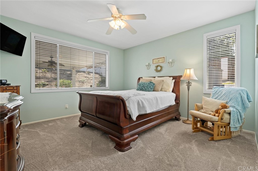 20803 Millbrook Street Riverside, CA 92508 - Photo 19 of 44 a bedroom with a bed and a window