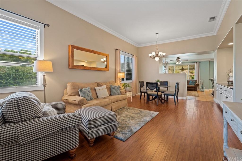 20803 Millbrook Street Riverside, CA 92508 - Photo 3 of 44 a living room with furniture and wooden floor