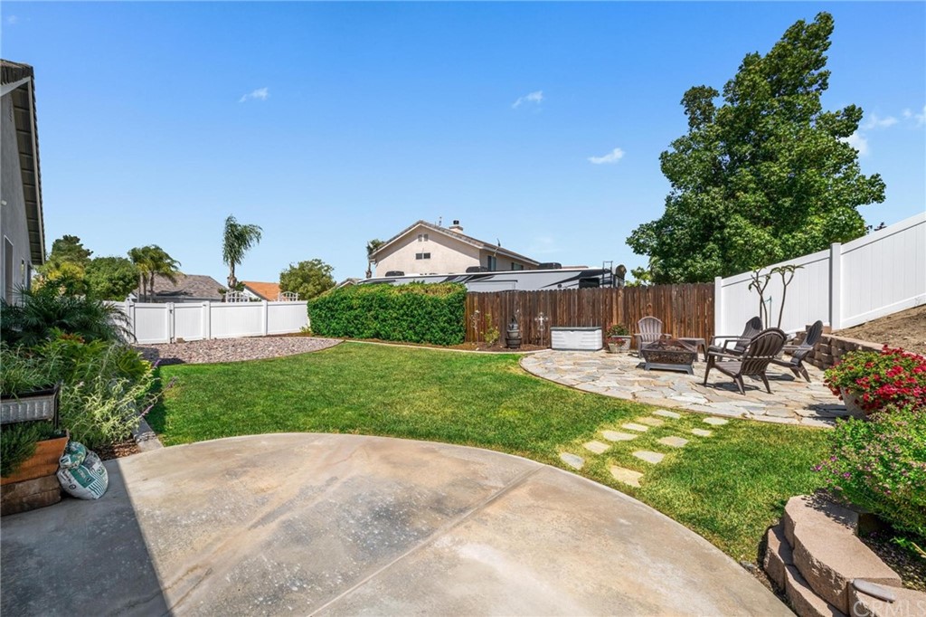 20803 Millbrook Street Riverside, CA 92508 - Photo 37 of 44 a view of a backyard with sitting area