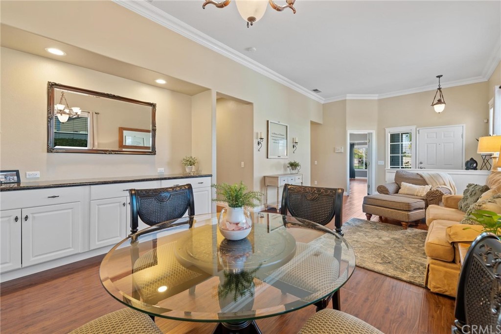 20803 Millbrook Street Riverside, CA 92508 - Photo 4 of 44 a living room with furniture and wooden floor