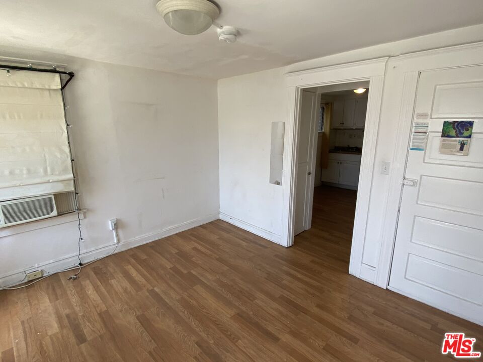 44 Rose Avenue Venice, CA 90291 - Photo 24 of 33 wooden floor in an empty room with a window