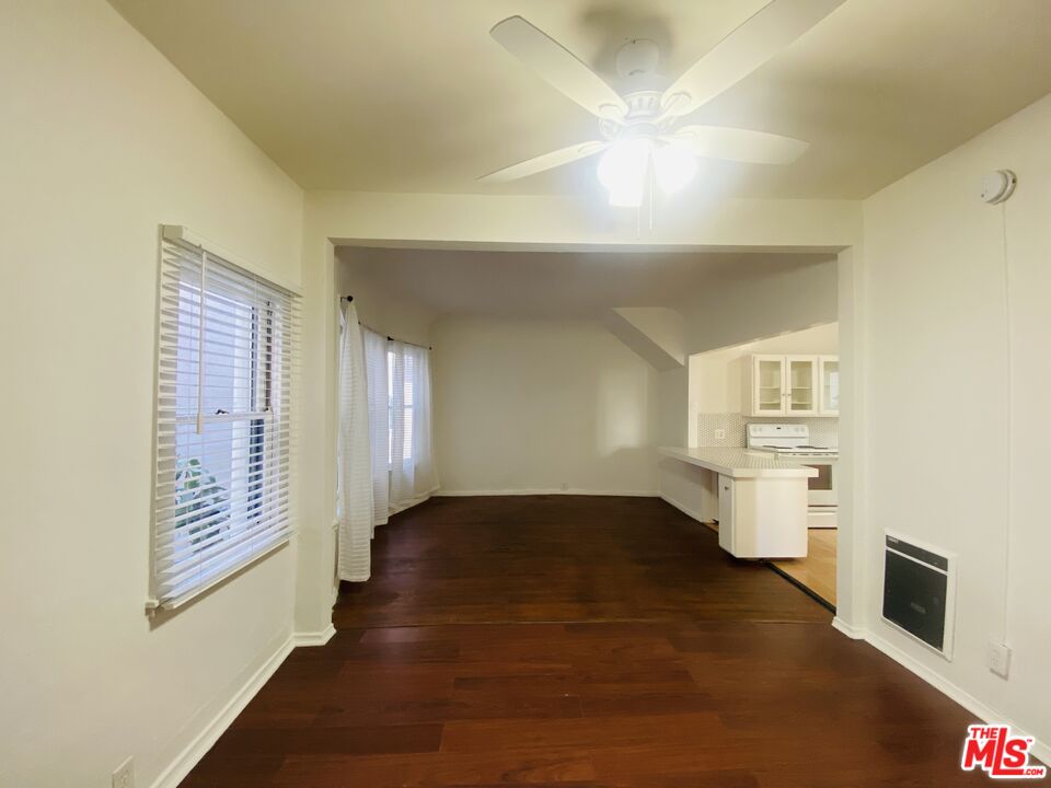 44 Rose Avenue Venice, CA 90291 - Photo 27 of 33 wooden floor in an empty room with a fireplace
