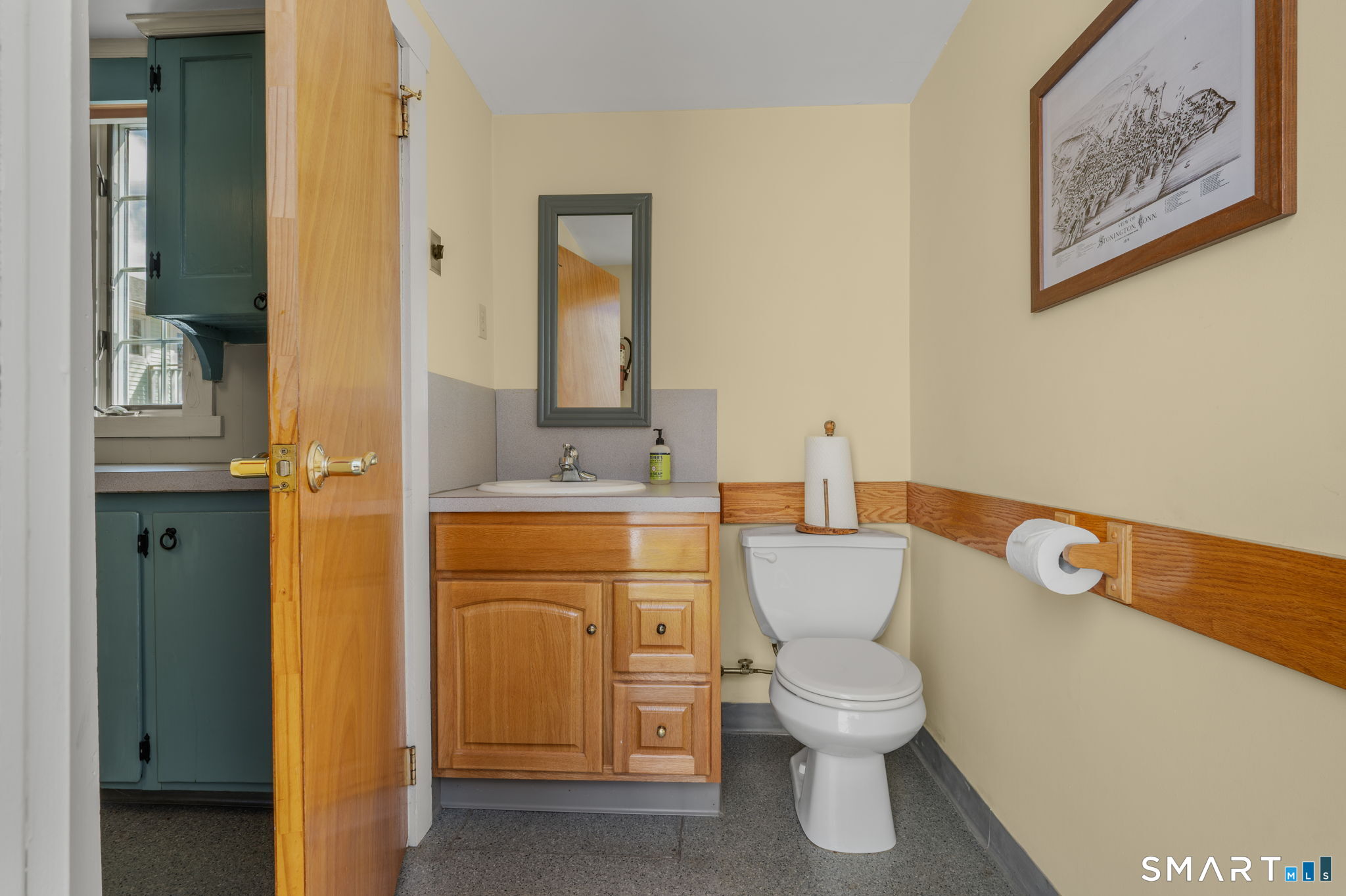 6 Hatch Street Stonington, CT 06355 - Photo 12 of 26 a bathroom with a toilet sink and mirror
