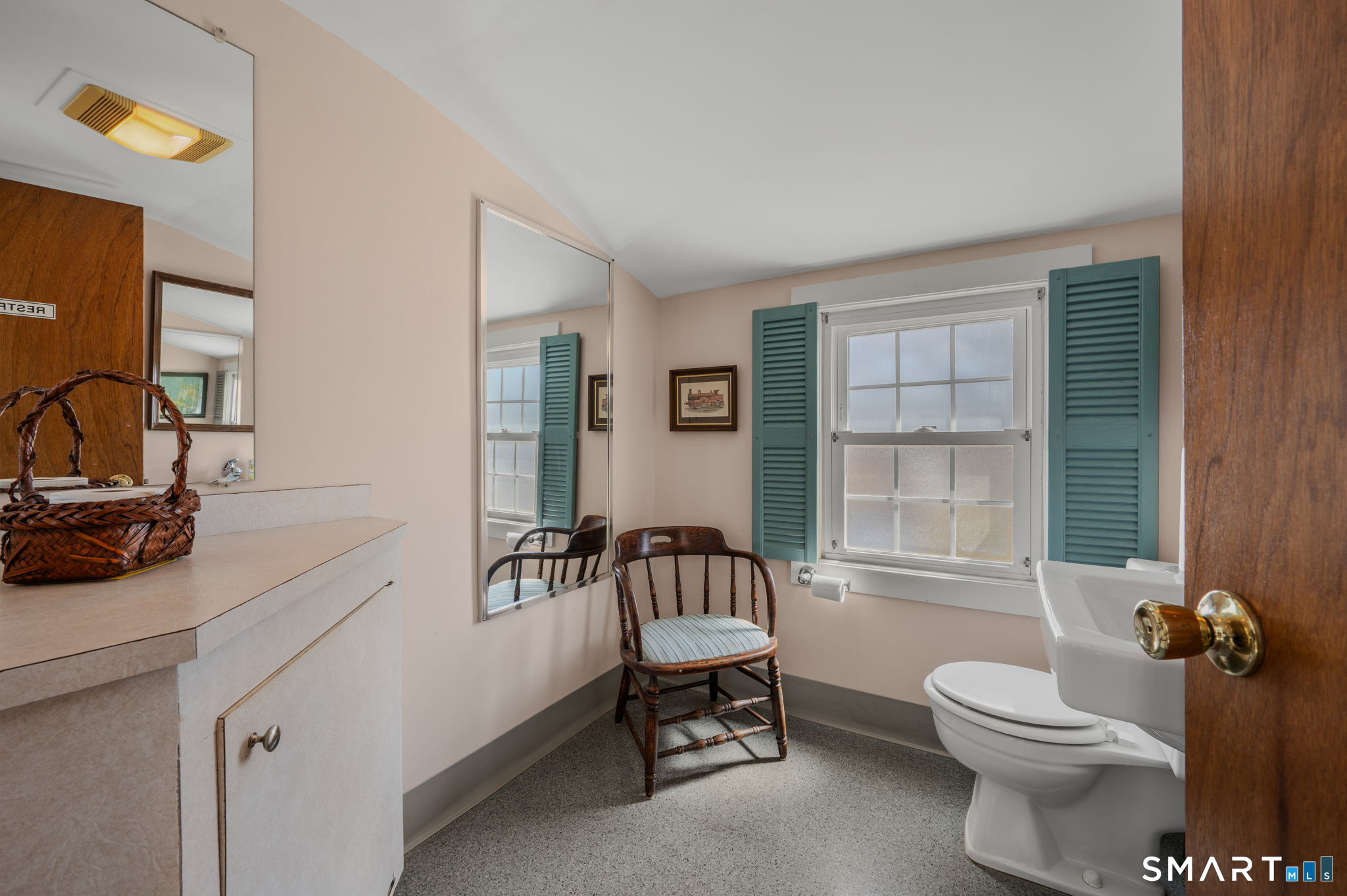 6 Hatch Street Stonington, CT 06355 - Photo 15 of 26 a bathroom with a toilet a sink and a bathtub