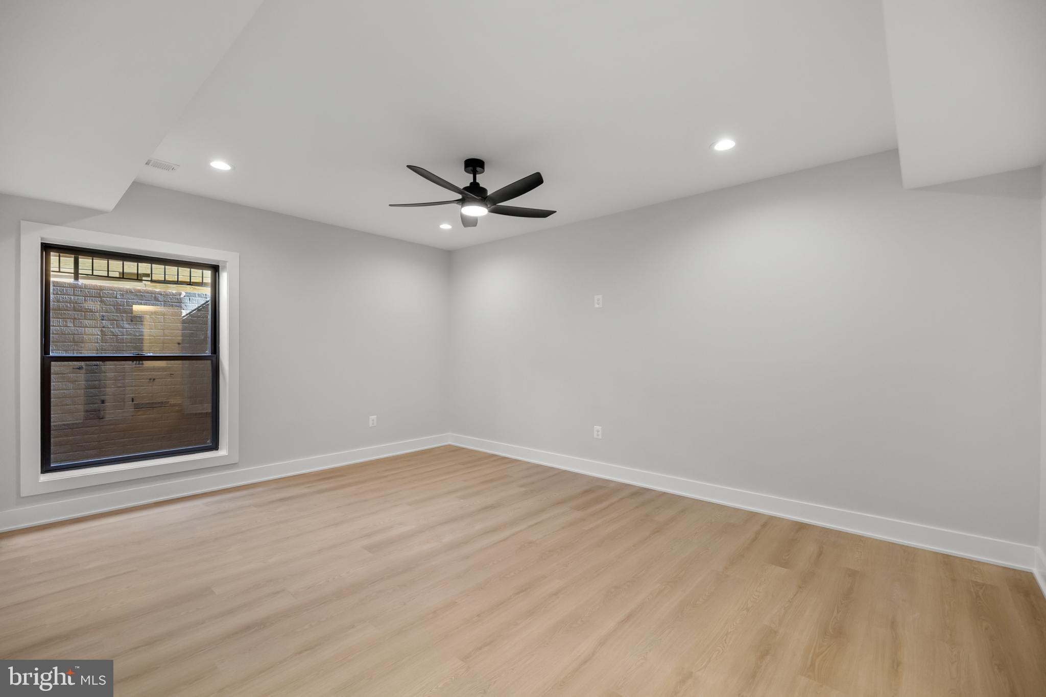 1852 Griffith Road Falls Church, VA 22043 - Photo 102 of 110 wooden floor in an empty room with a window