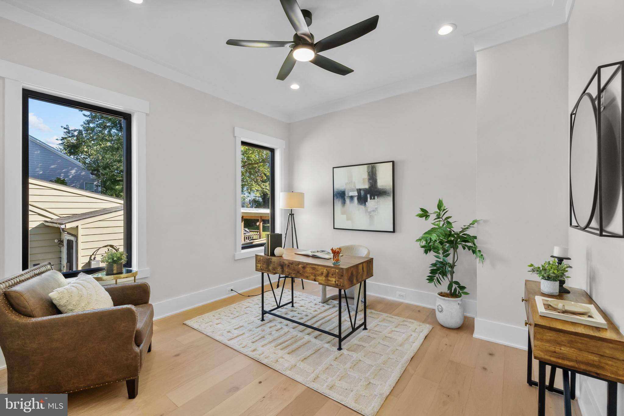 1852 Griffith Road Falls Church, VA 22043 - Photo 13 of 110 a living room with furniture and a potted plant