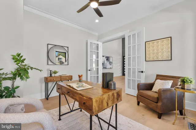 a kitchen with granite countertop white cabinets and white stainless steel appliances