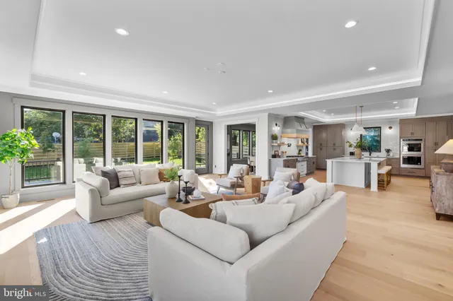 a view of a livingroom with a furniture and windows
