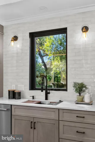 a bedroom with a bed and a stove top oven