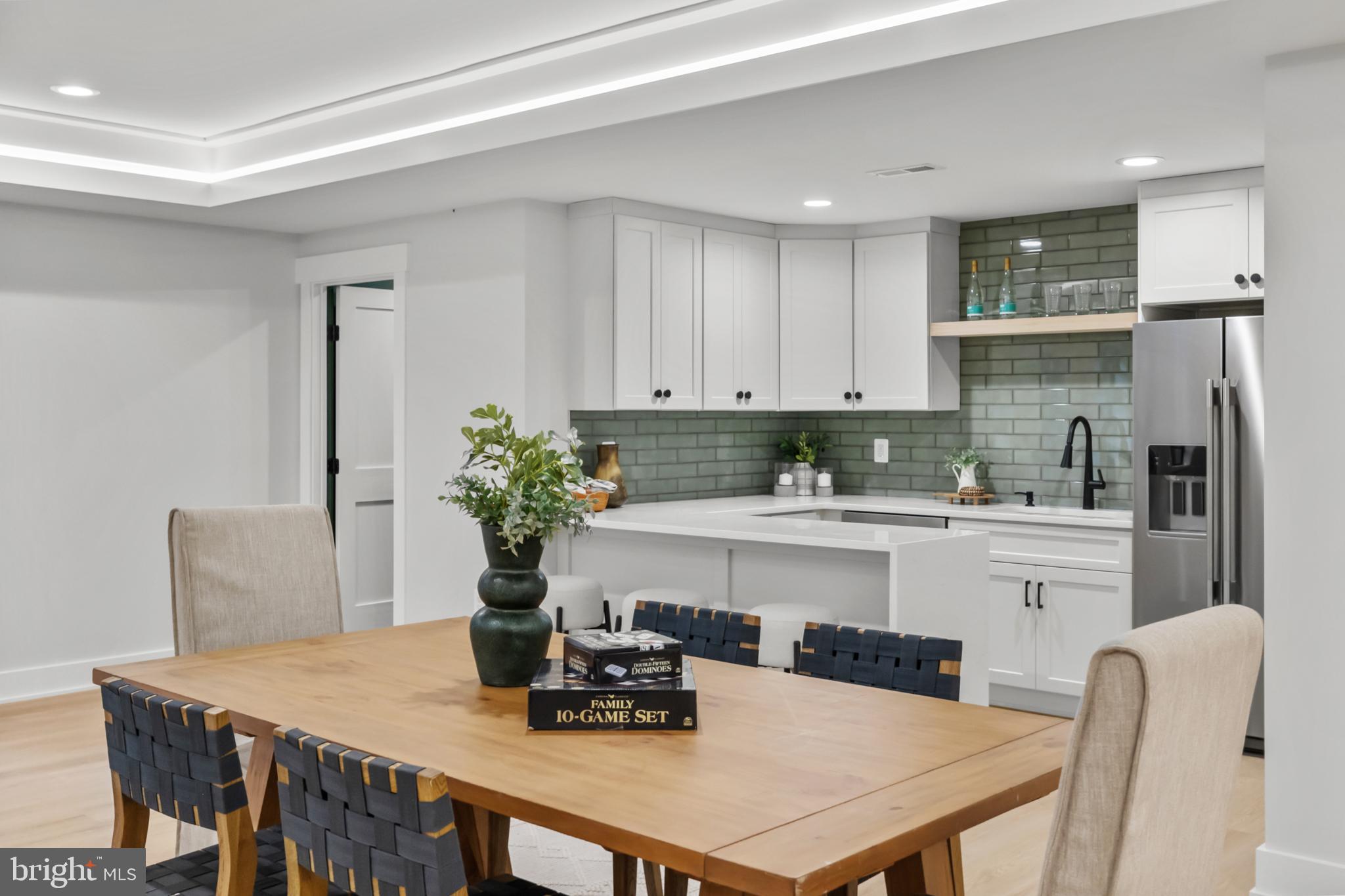 1852 Griffith Road Falls Church, VA 22043 - Photo 90 of 110 a kitchen with a table and chairs