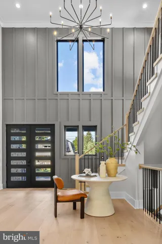 a living room with fireplace furniture and a flat screen tv