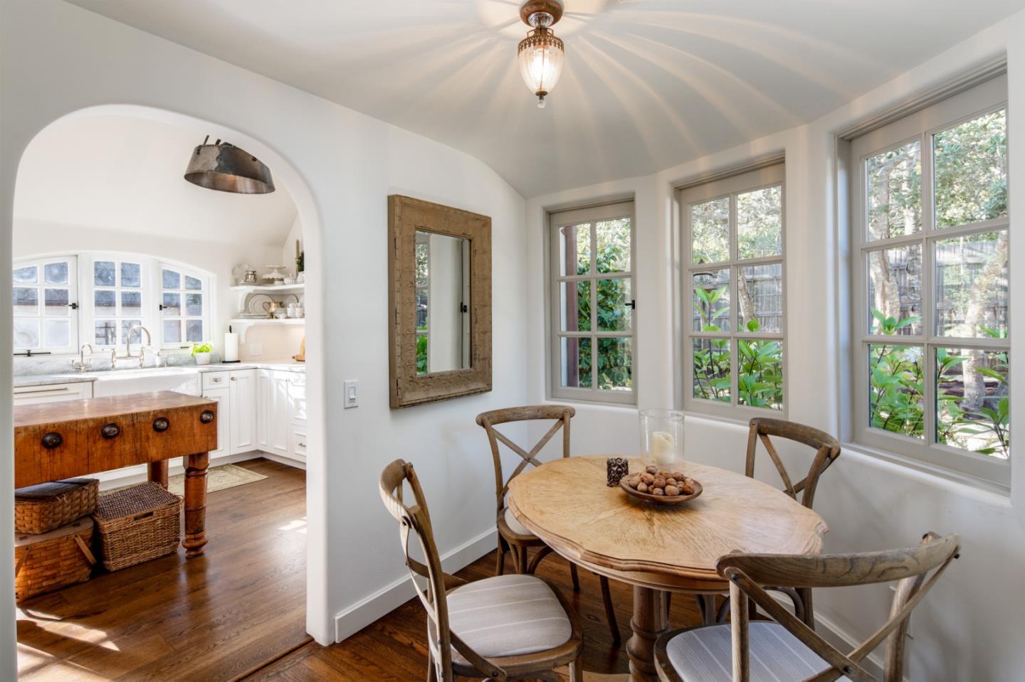 25148 Hatton Road Carmel, CA 93923 - Photo 12 of 33 a view of a dining room with furniture window and outside view