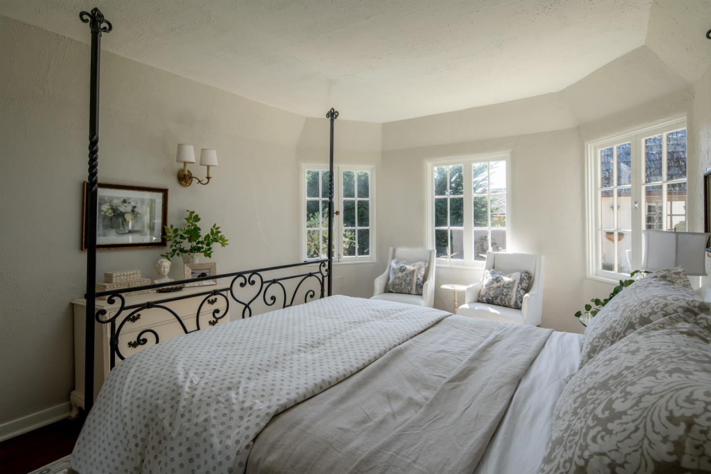 25148 Hatton Road Carmel, CA 93923 - Photo 17 of 33 a bedroom with a bed and window