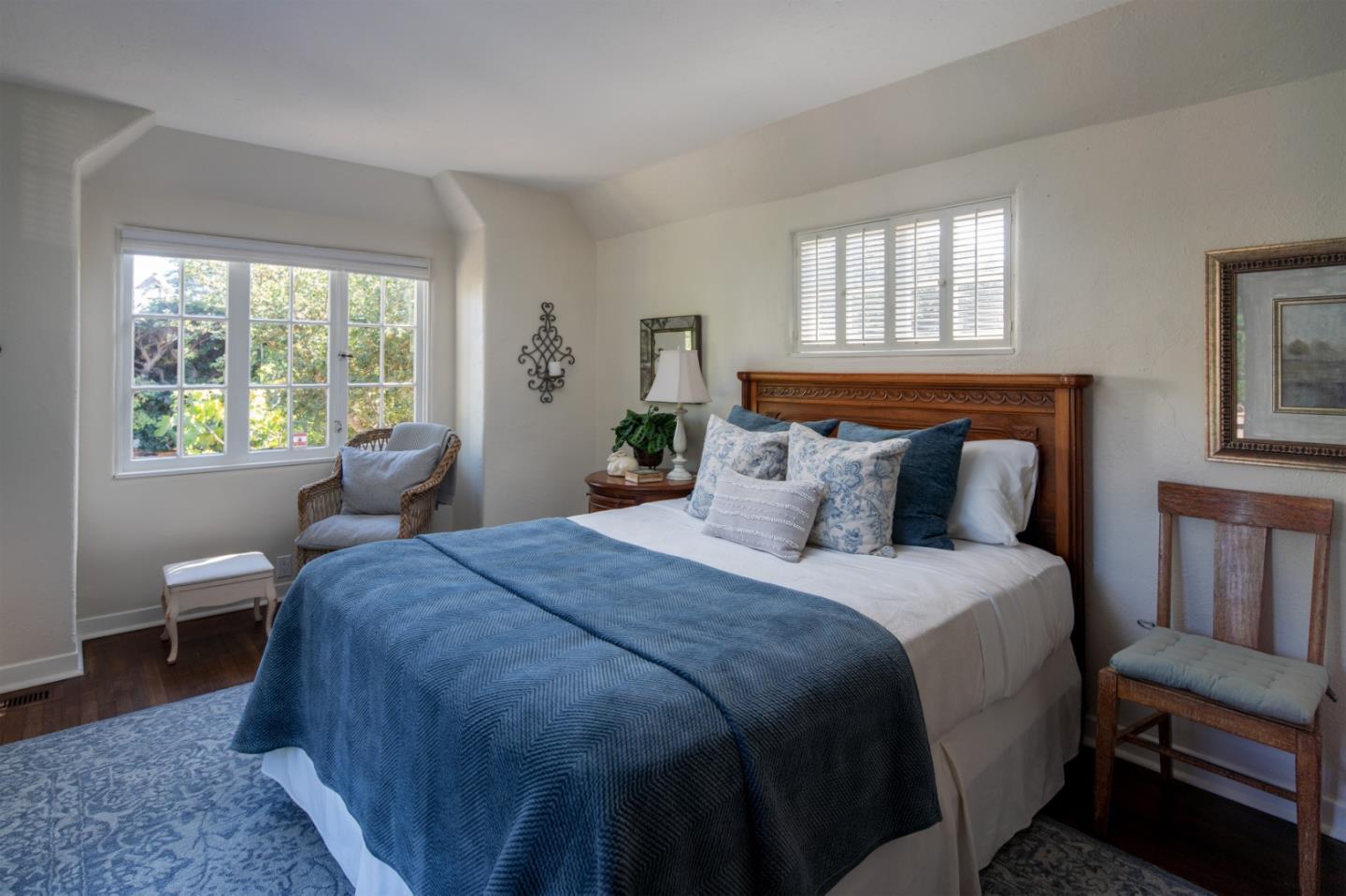 25148 Hatton Road Carmel, CA 93923 - Photo 21 of 33 a bedroom with a bed and windows