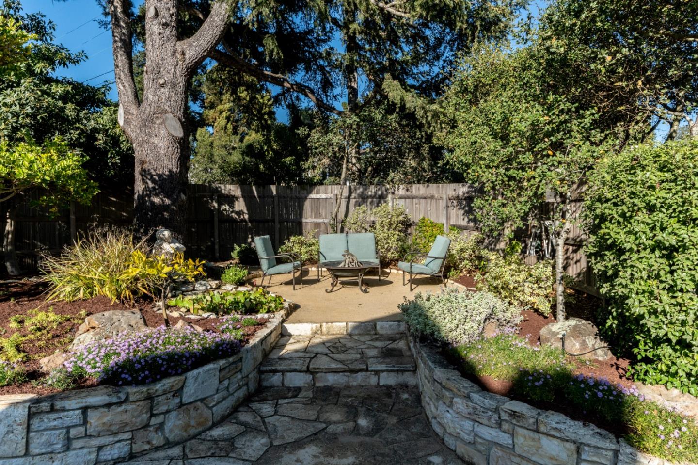 25148 Hatton Road Carmel, CA 93923 - Photo 25 of 33 a view of a backyard with sitting area
