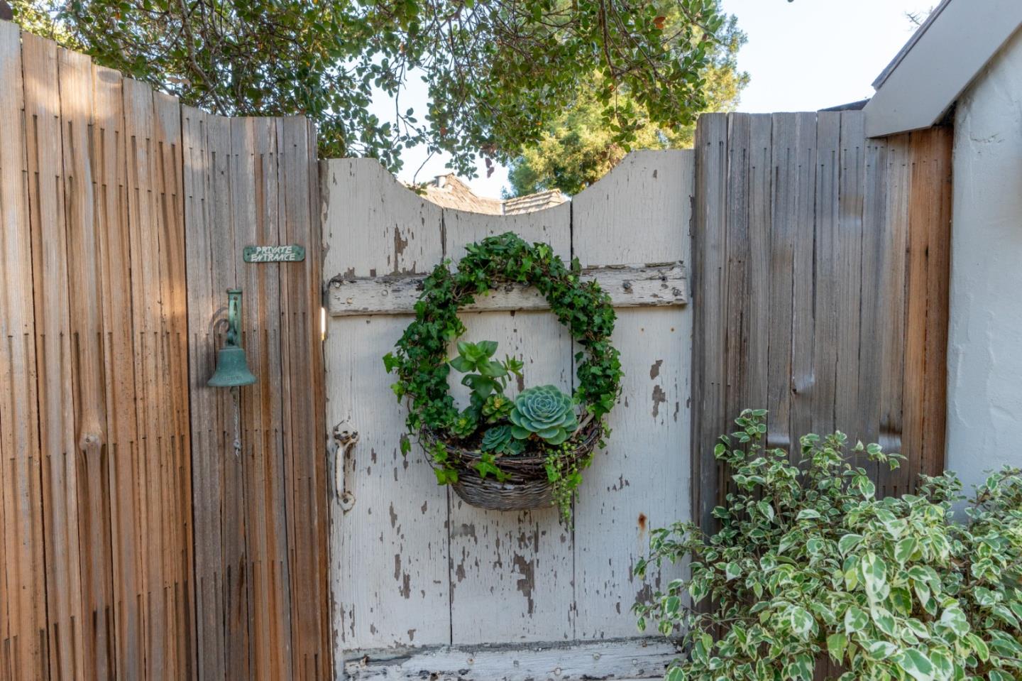 25148 Hatton Road Carmel, CA 93923 - Photo 32 of 33 a plant that is in front of wooden door