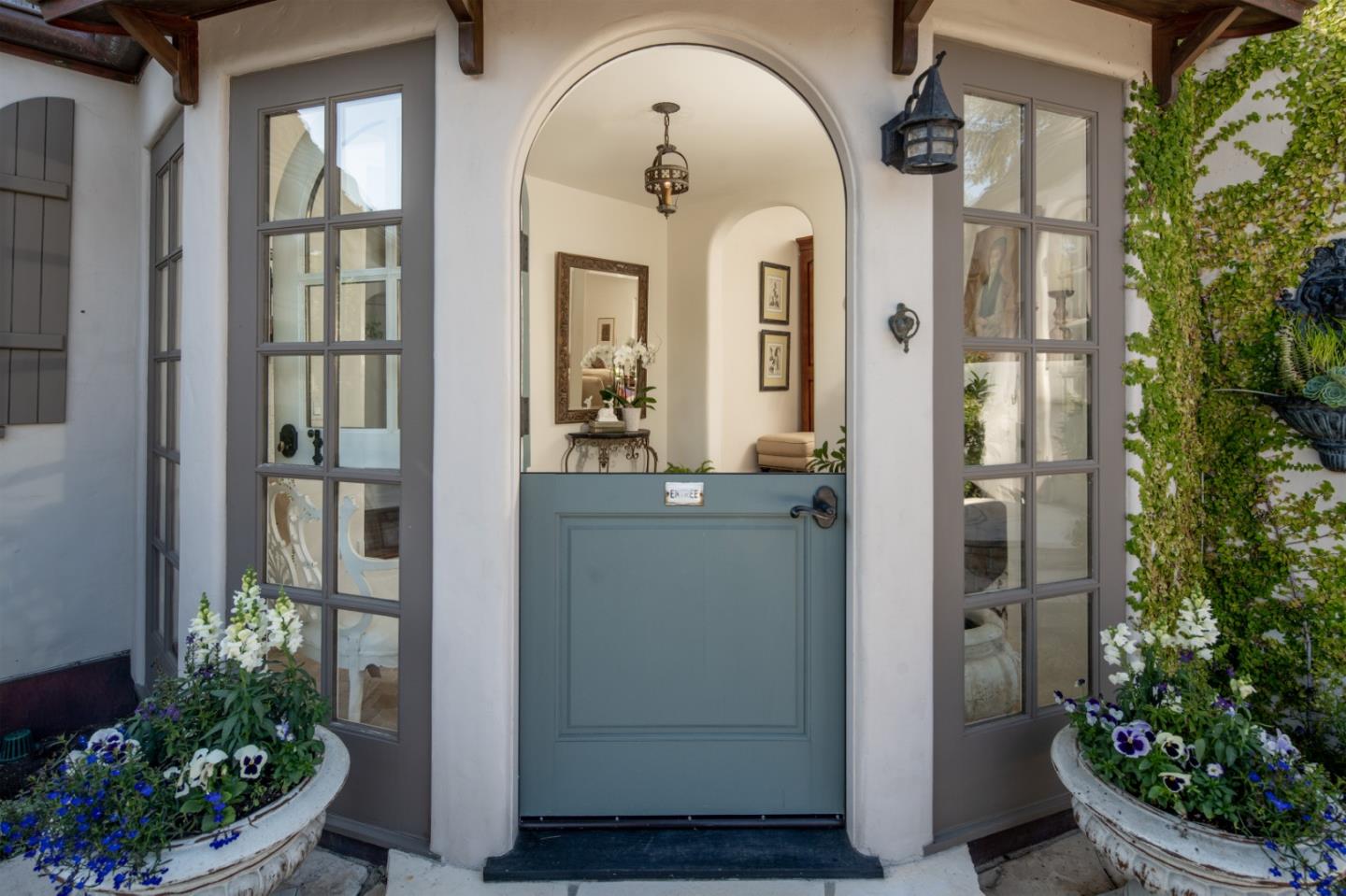 25148 Hatton Road Carmel, CA 93923 - Photo 4 of 33 a view of a entryway door of the house
