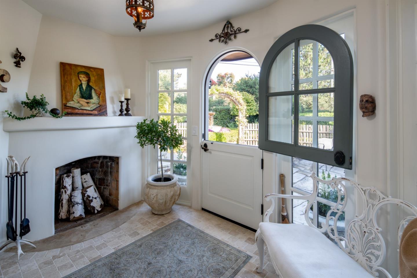 25148 Hatton Road Carmel, CA 93923 - Photo 5 of 33 a living room with furniture and a fireplace