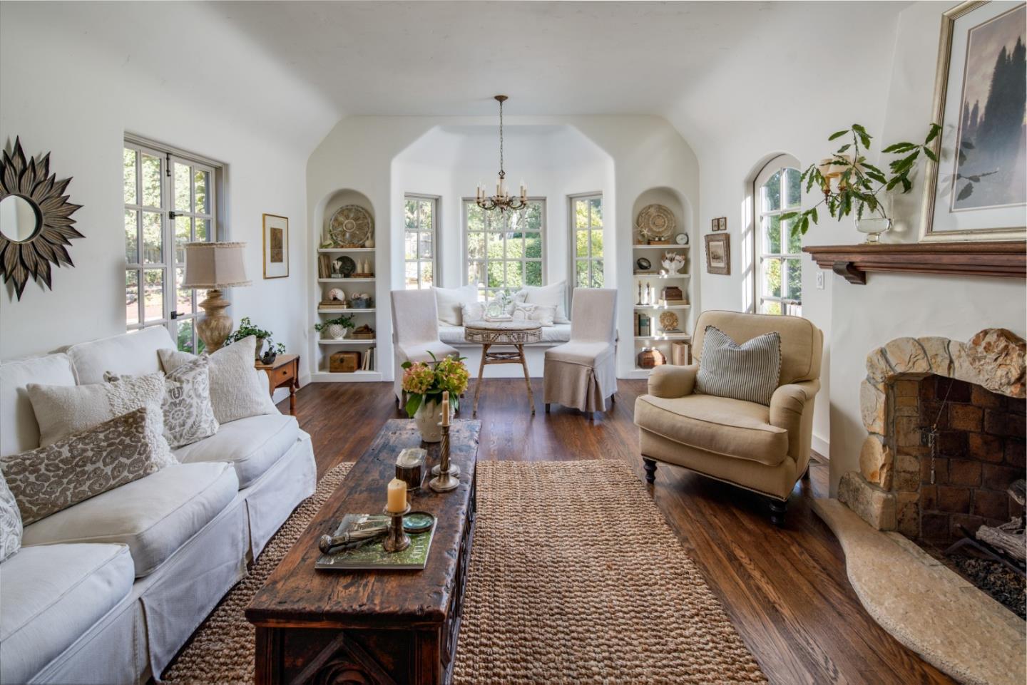 25148 Hatton Road Carmel, CA 93923 - Photo 6 of 33 a living room with furniture fireplace and a large window