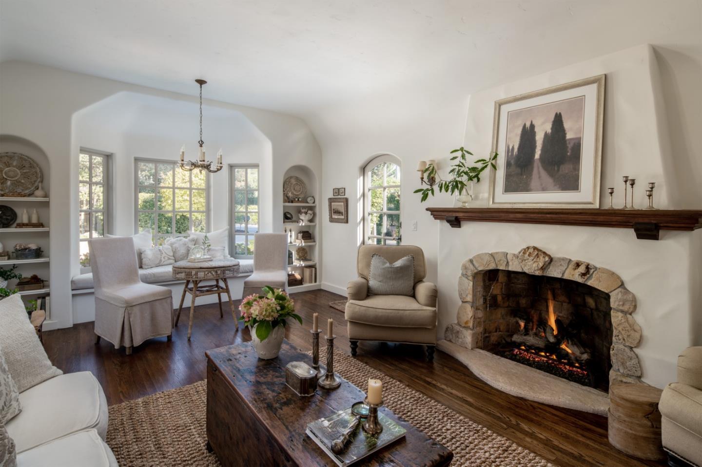 25148 Hatton Road Carmel, CA 93923 - Photo 7 of 33 a living room with furniture and a fireplace
